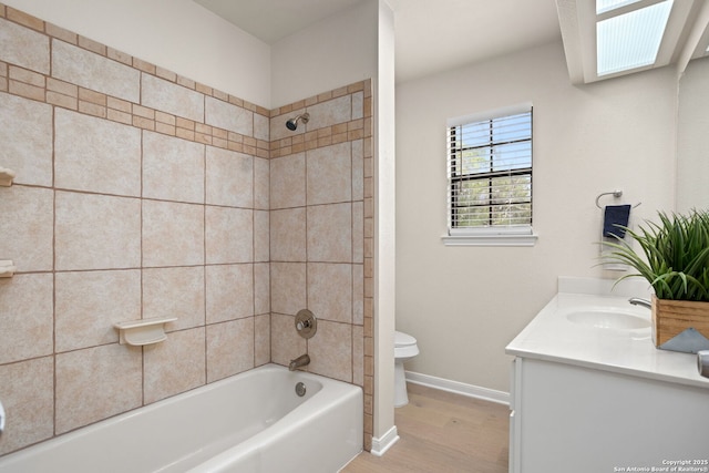 3010 Skyline, Canyon Lake, TX 78133 - full bath featuring toilet, wood finished floors, baseboards, vanity, and shower / bath combination