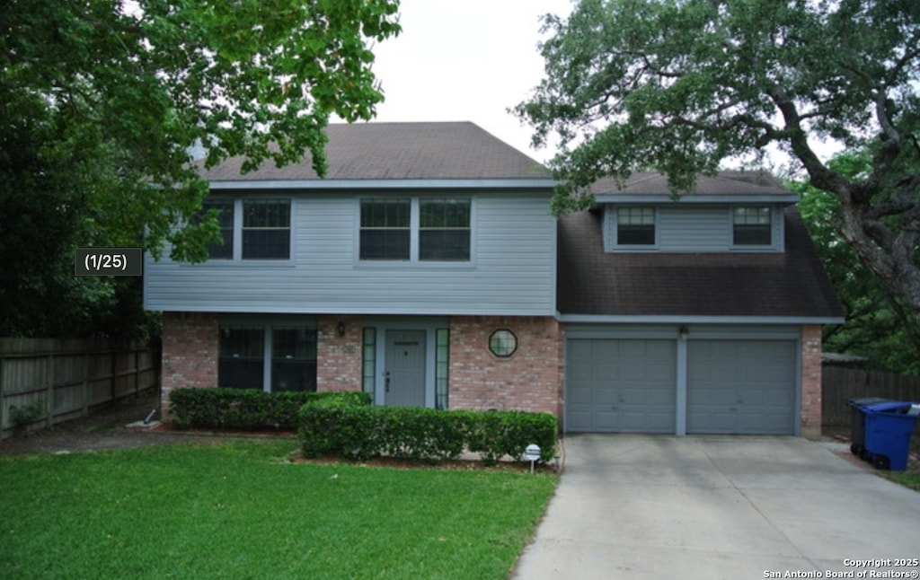 11615 Dundalk, San Antonio, TX 78251 - view of front of home featuring brick siding, driveway, and an attached garage