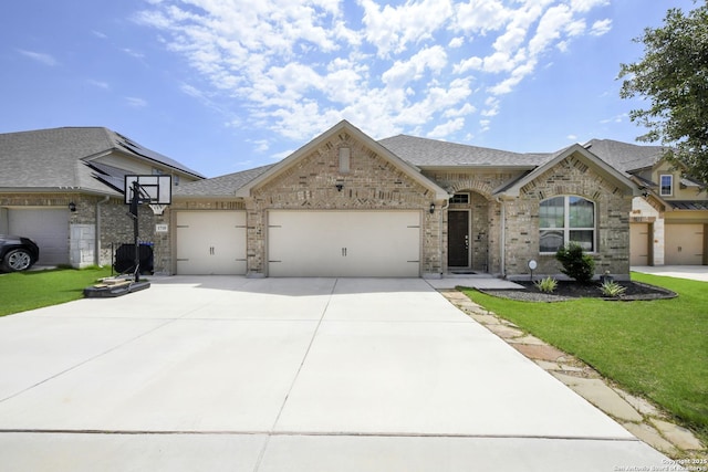 1710 Briar Spg, San Antonio, TX 78245 - french country home featuring a garage, brick siding, driveway, a front lawn, and a shingled roof