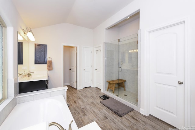 1710 Briar Spg, San Antonio, TX 78245 - full bath with a stall shower, lofted ceiling, wood finished floors, a garden tub, and vanity