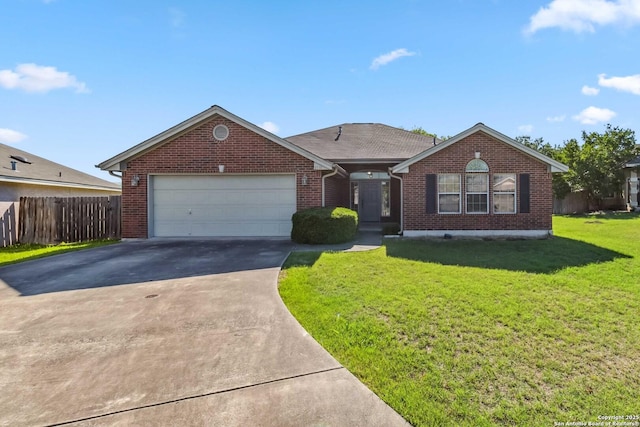 view of front of house featuring brick siding, driveway, and an attached garage