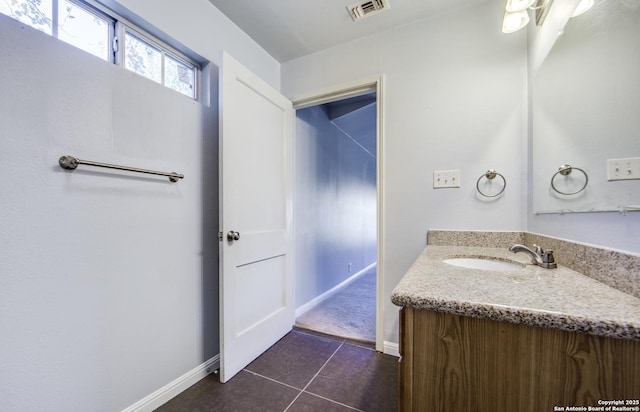 314 Gazel, San Antonio, TX 78213 - bathroom with tile patterned flooring, vanity, and baseboards