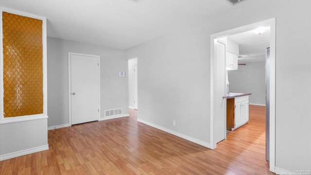 4722 Casa Manana, San Antonio, TX 78233 - empty room with light wood finished floors and baseboards