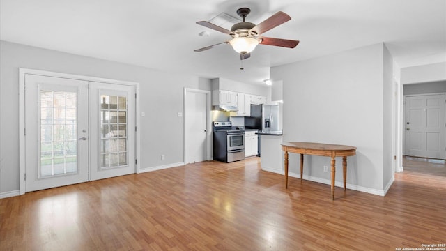 4722 Casa Manana, San Antonio, TX 78233 - unfurnished living room featuring light wood finished floors, french doors, a ceiling fan, and baseboards