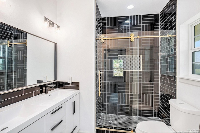 1615 N Guadalupe, Seguin, TX 78155 - bathroom featuring toilet, a shower stall, vanity, and recessed lighting