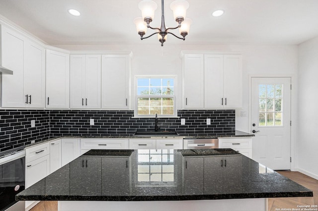 1615 N Guadalupe, Seguin, TX 78155 - kitchen featuring a sink, a chandelier, plenty of natural light, white cabinets, and recessed lighting