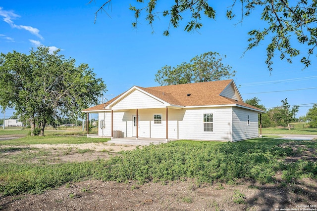 1615 N Guadalupe, Seguin, TX 78155 - rear view of house featuring roof with shingles