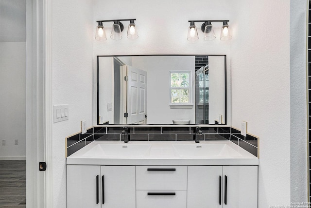 1615 N Guadalupe, Seguin, TX 78155 - bathroom featuring double vanity and a shower with shower door