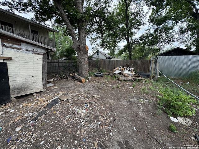 2429 Potosi, San Antonio, TX 78207 - view of yard featuring fence and a balcony