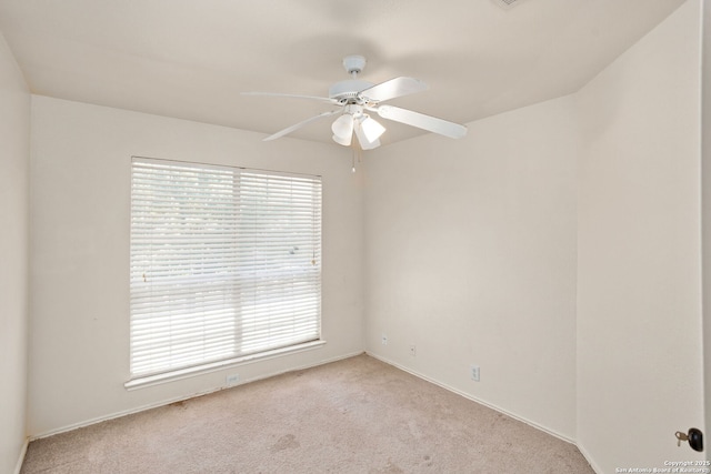 3601 Diamond Fls, Schertz, TX 78154 - spare room featuring light colored carpet, a ceiling fan, and healthy amount of natural light
