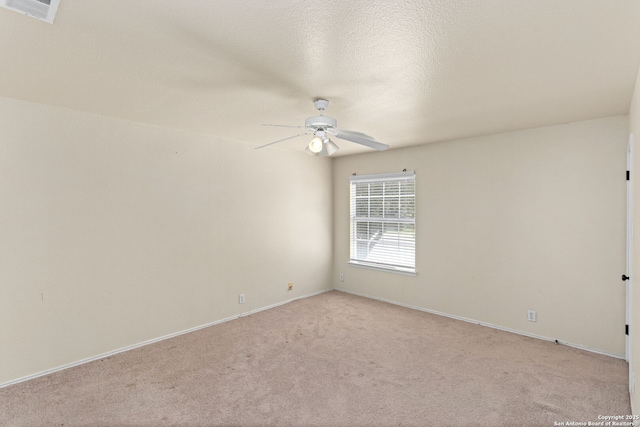 3601 Diamond Fls, Schertz, TX 78154 - unfurnished room with ceiling fan, light carpet, and baseboards