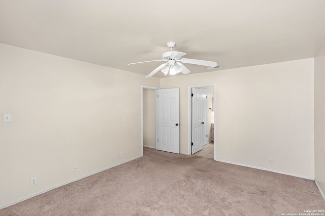 3601 Diamond Fls, Schertz, TX 78154 - unfurnished room with light carpet, ceiling fan, and baseboards