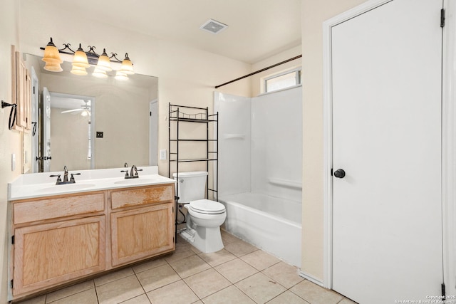 3601 Diamond Fls, Schertz, TX 78154 - bathroom featuring toilet, tile patterned flooring, a ceiling fan, double vanity, and bathing tub / shower combination