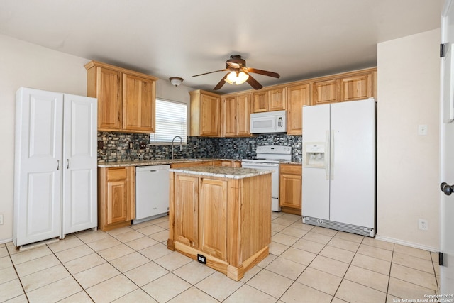 3601 Diamond Fls, Schertz, TX 78154 - kitchen with white appliances, ceiling fan, decorative backsplash, and a kitchen island