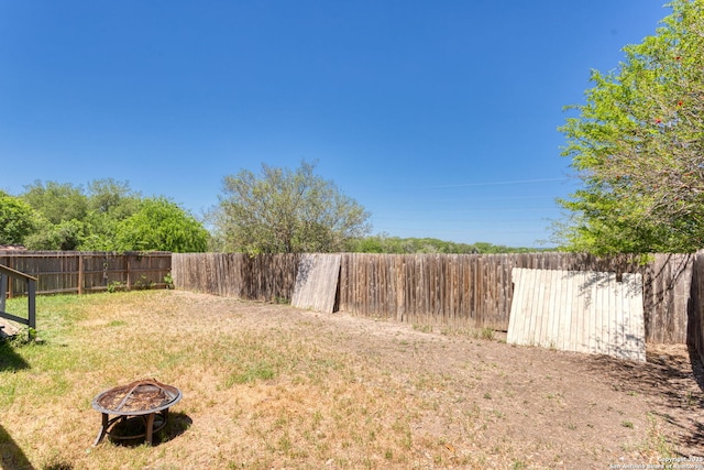 3601 Diamond Fls, Schertz, TX 78154 - view of yard featuring an outdoor fire pit