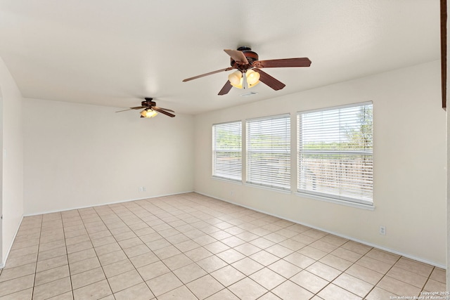 3601 Diamond Fls, Schertz, TX 78154 - spare room with a ceiling fan, baseboards, and light tile patterned floors
