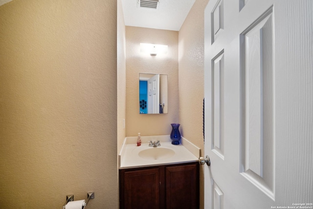 934 Saxonhill, San Antonio, TX 78253 - bathroom featuring vanity and a textured wall