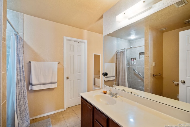 934 Saxonhill, San Antonio, TX 78253 - full bath featuring tile patterned flooring, a tile shower, vanity, and baseboards