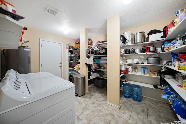 934 Saxonhill, San Antonio, TX 78253 - washroom featuring water heater, a textured ceiling, and light tile patterned floors