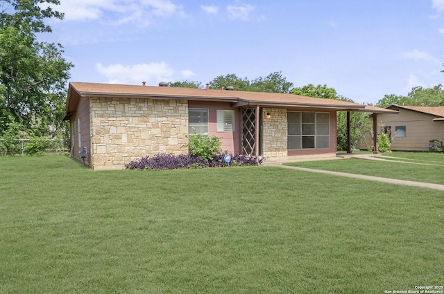 6711 Greencastle, San Antonio, TX 78242 - ranch-style house featuring stone siding and a front lawn