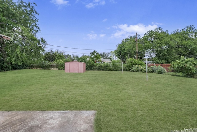 6711 Greencastle, San Antonio, TX 78242 - view of yard with a storage unit and an outbuilding