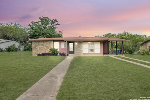 6711 Greencastle, San Antonio, TX 78242 - view of front of home featuring a yard and stone siding