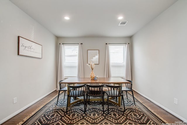 7606 Cottonwood Fls, Spring, TX 77379 - dining space with wood finished floors, healthy amount of natural light, recessed lighting, and baseboards