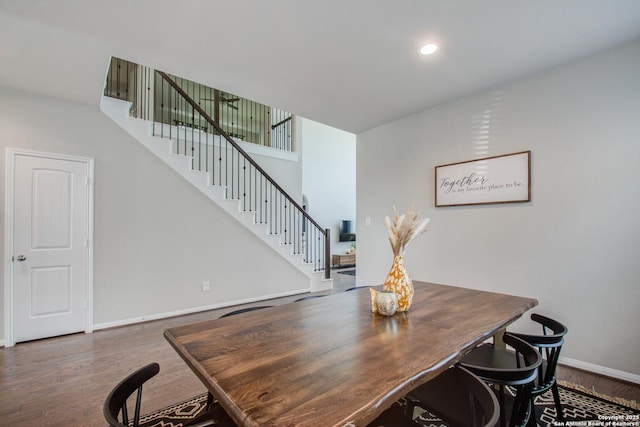 7606 Cottonwood Fls, Spring, TX 77379 - dining room with stairs, wood finished floors, baseboards, and recessed lighting