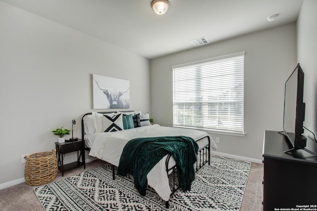 7606 Cottonwood Fls, Spring, TX 77379 - carpeted bedroom with baseboards