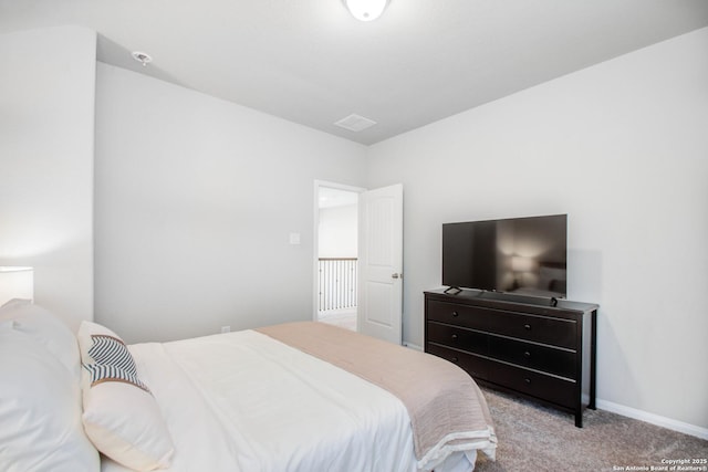 7606 Cottonwood Fls, Spring, TX 77379 - bedroom featuring carpet flooring and baseboards