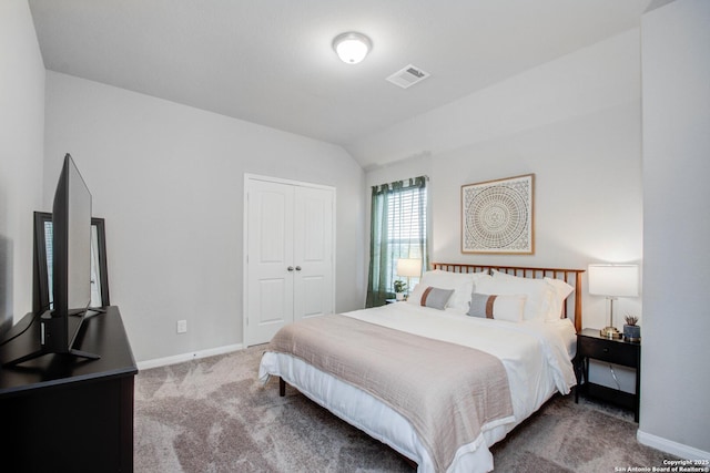 7606 Cottonwood Fls, Spring, TX 77379 - bedroom with carpet floors, baseboards, a closet, and lofted ceiling