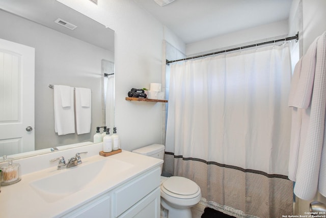 7606 Cottonwood Fls, Spring, TX 77379 - bathroom featuring toilet, vanity, and curtained shower