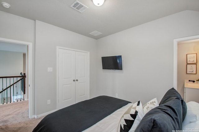 7606 Cottonwood Fls, Spring, TX 77379 - bedroom with carpet, a closet, and baseboards