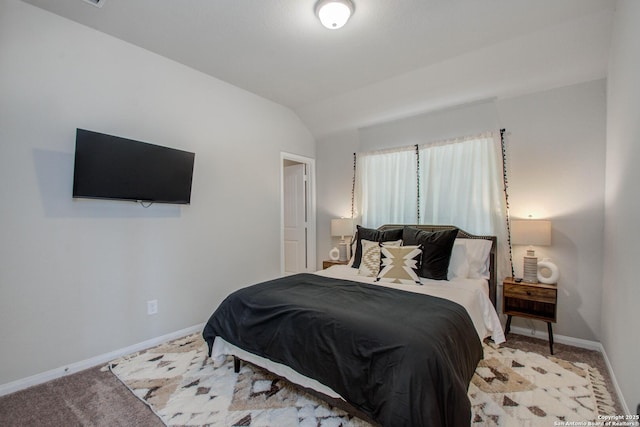 7606 Cottonwood Fls, Spring, TX 77379 - bedroom with baseboards, vaulted ceiling, and light colored carpet