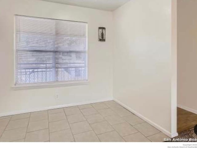 923 Vance Jackson Unit 1210, San Antonio, TX 78201 - spare room featuring baseboards