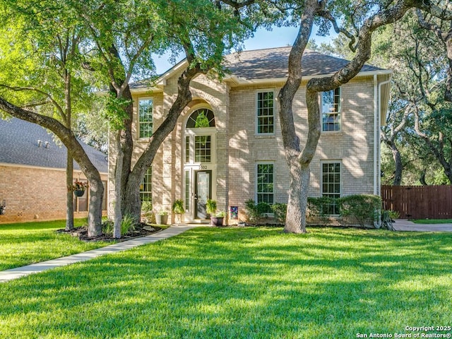 view of front of home featuring brick siding