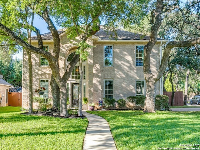 view of front of house with brick siding