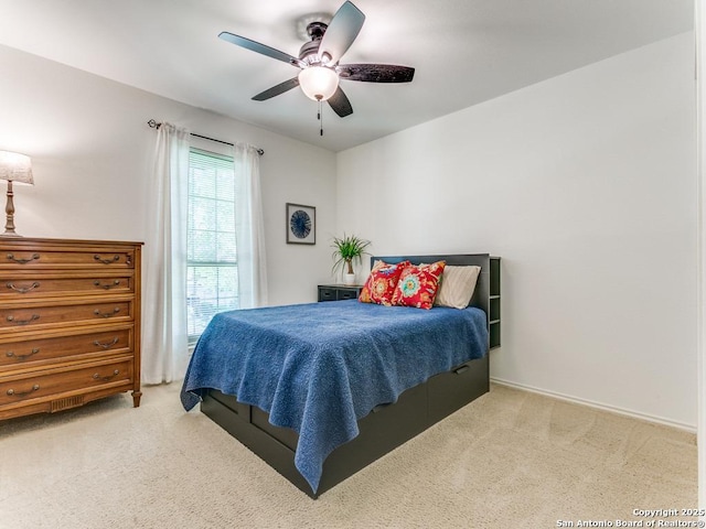 bedroom featuring carpet floors and ceiling fan