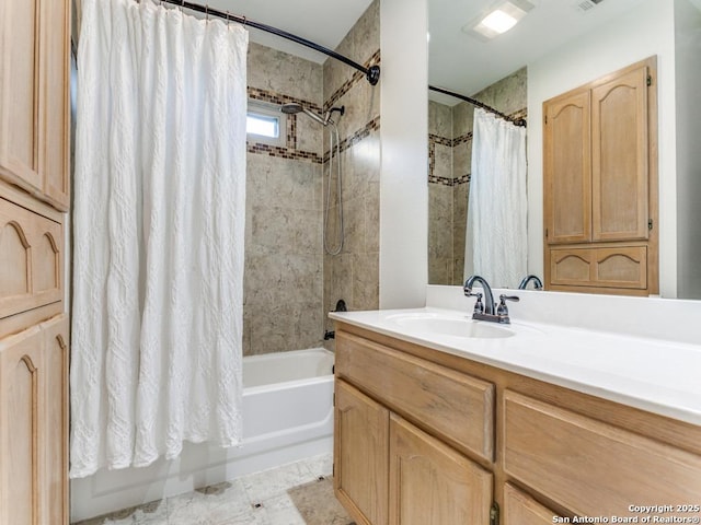 bathroom with shower / tub combo with curtain and vanity
