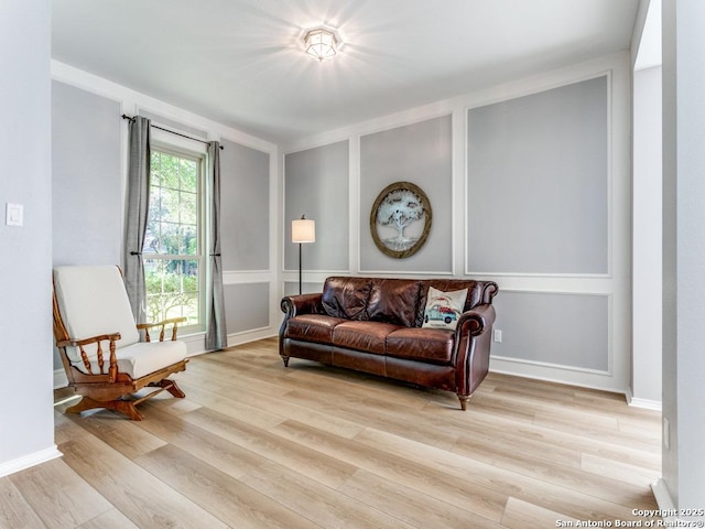 sitting room with wood finished floors