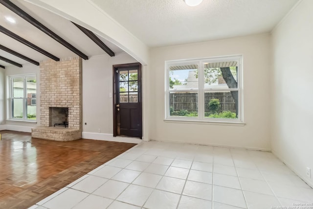 10514 Merritime Ct, San Antonio, TX 78217 - foyer entrance with a brick fireplace, baseboards, and a textured ceiling