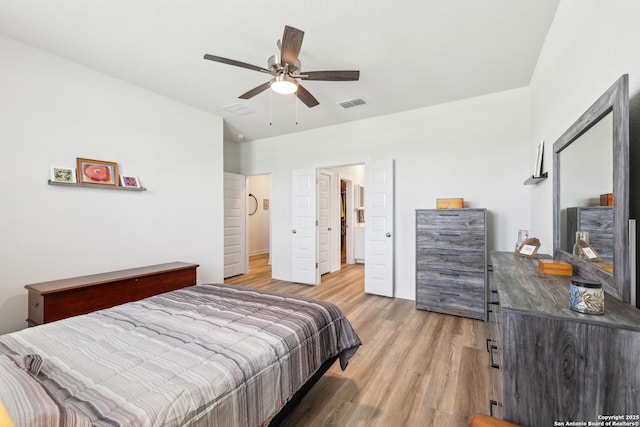 306 Banff, Kyle, TX 78640 - bedroom with light wood-style flooring and ceiling fan