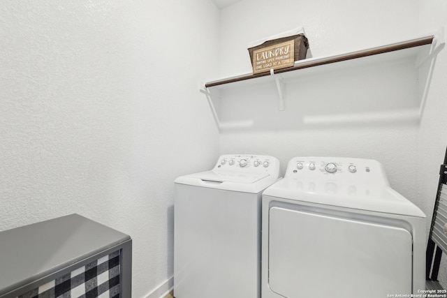 306 Banff, Kyle, TX 78640 - clothes washing area with washer and clothes dryer