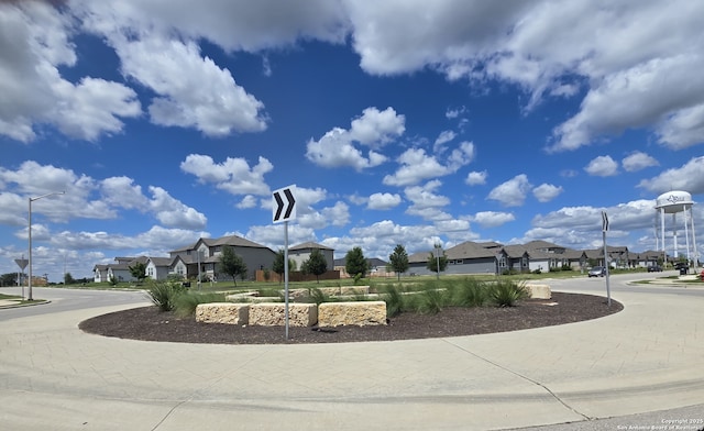 306 Banff, Kyle, TX 78640 - view of property's community with a residential view and curved driveway