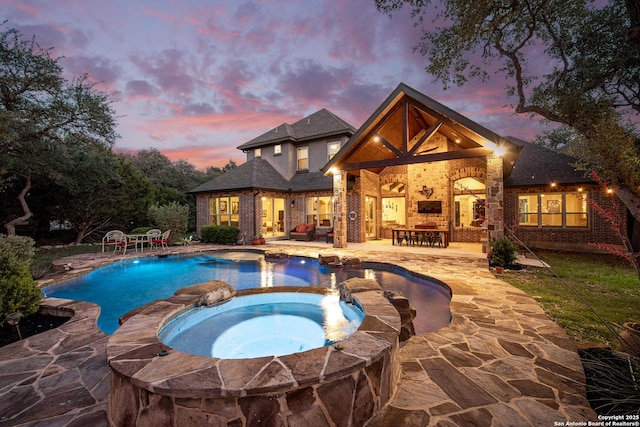 1040 Glenwood, Bulverde, TX 78163 - view of swimming pool featuring a patio area, a pool with connected hot tub, and an outdoor living space