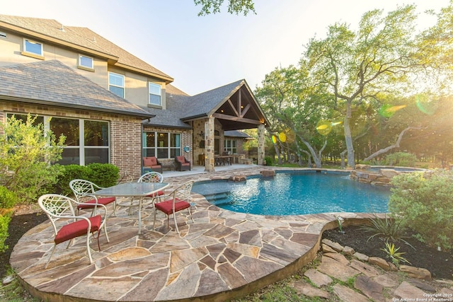 1040 Glenwood, Bulverde, TX 78163 - view of pool with a patio, an outdoor hangout area, and a pool with connected hot tub