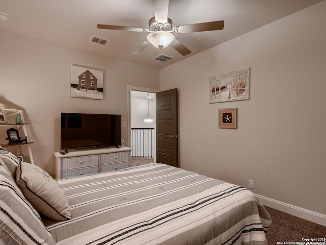 bedroom featuring carpet floors, baseboards, and ceiling fan