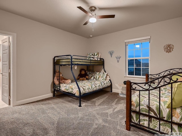 bedroom featuring carpet floors, baseboards, and a ceiling fan