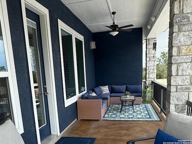 view of patio featuring ceiling fan and outdoor lounge area