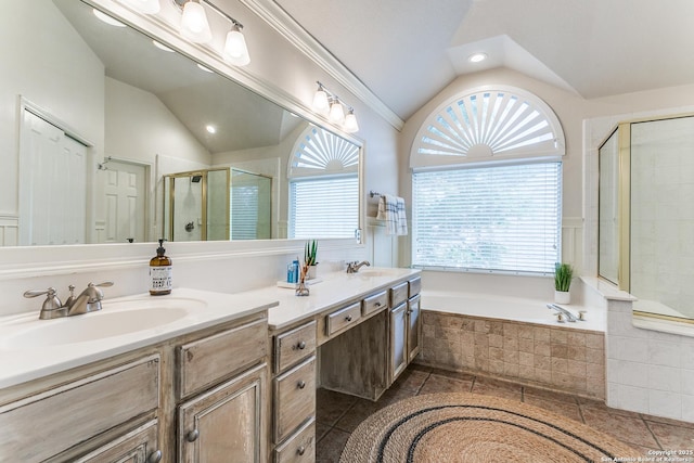 823 Peg Oak, San Antonio, TX 78258 - bathroom featuring vaulted ceiling, plenty of natural light, a stall shower, a bath, and double vanity